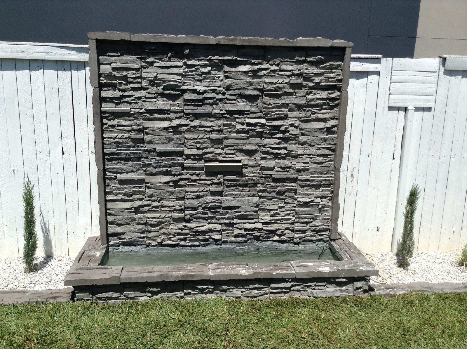 Steve-made stacked stone water feature in a Central Coast backyard