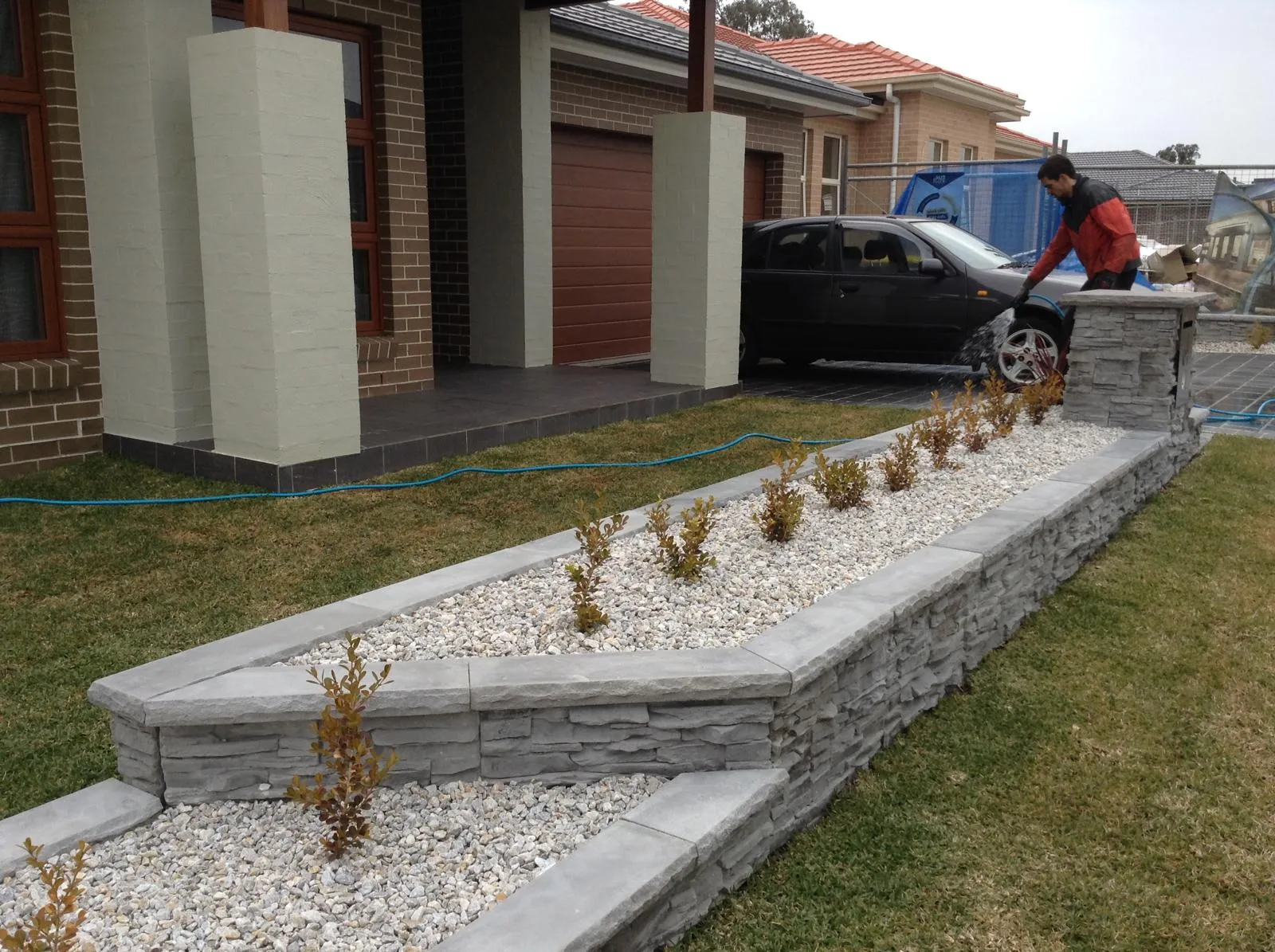 Front yard transformation with concrete sleepers