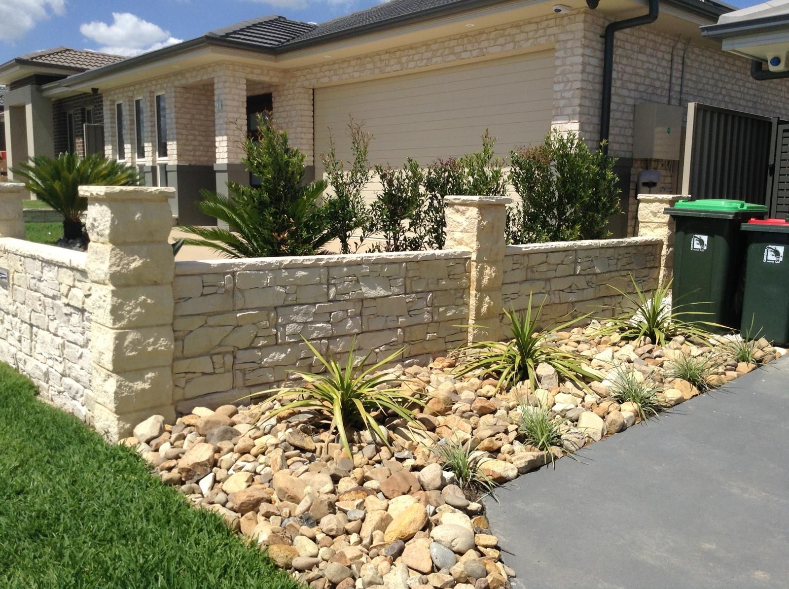 Sandstone-look feature wall and garden edging