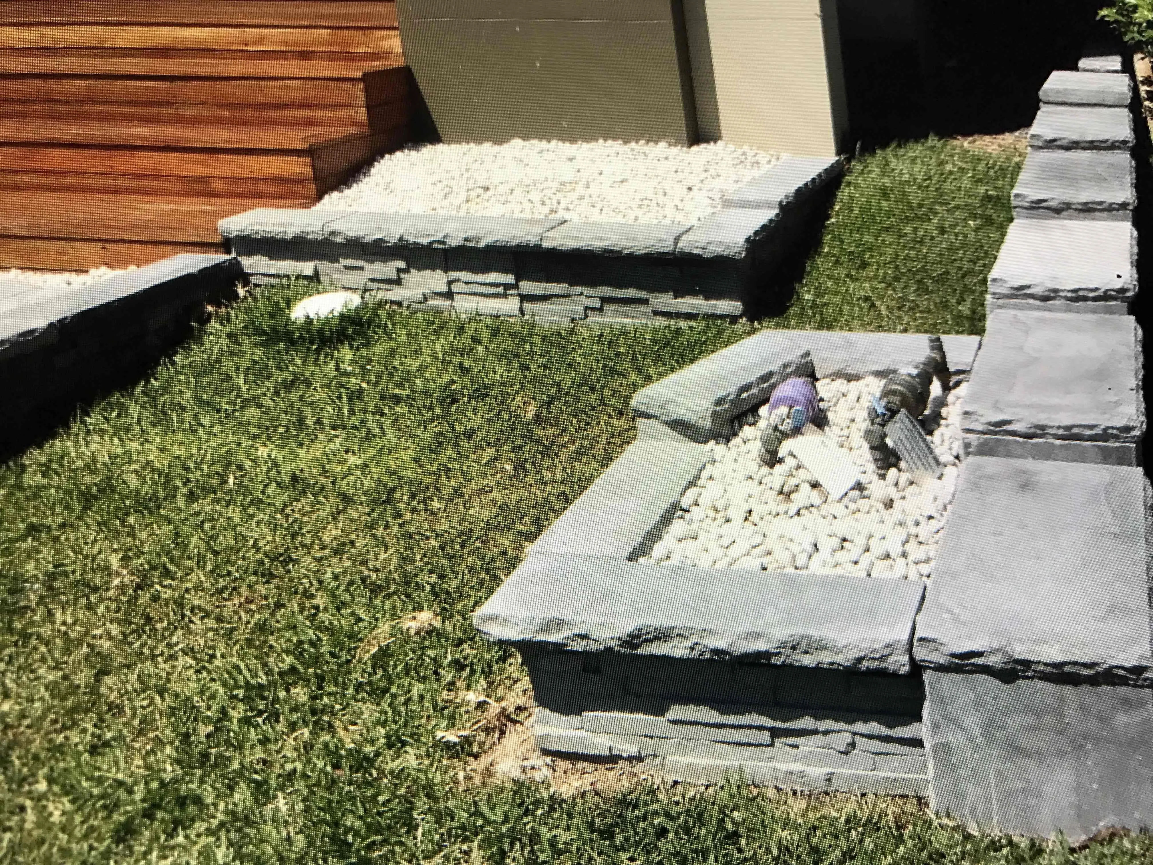 Multi-level sandstone retaining wall