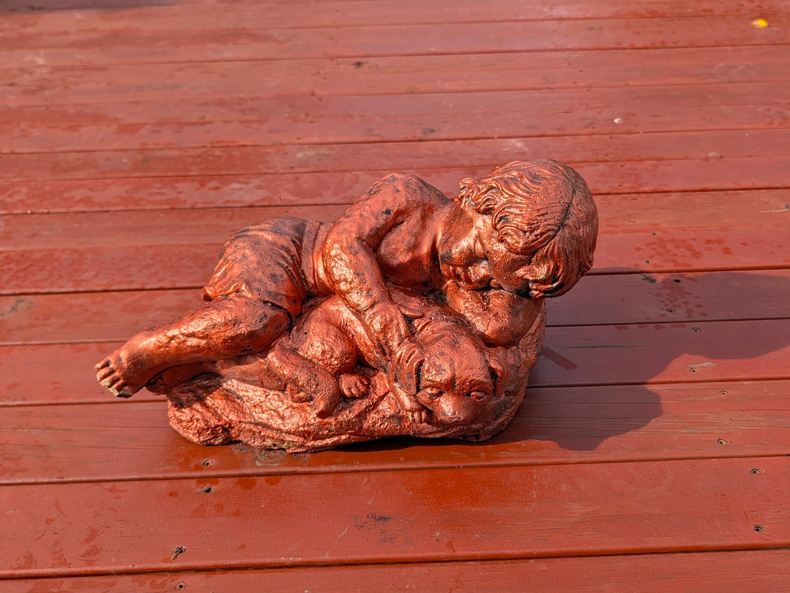 Baby with Dog Statue — Steve-made landscape product from Steve's Oasis Landscapes